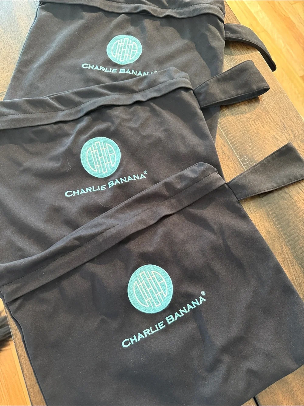 Charlie Banana teal items side