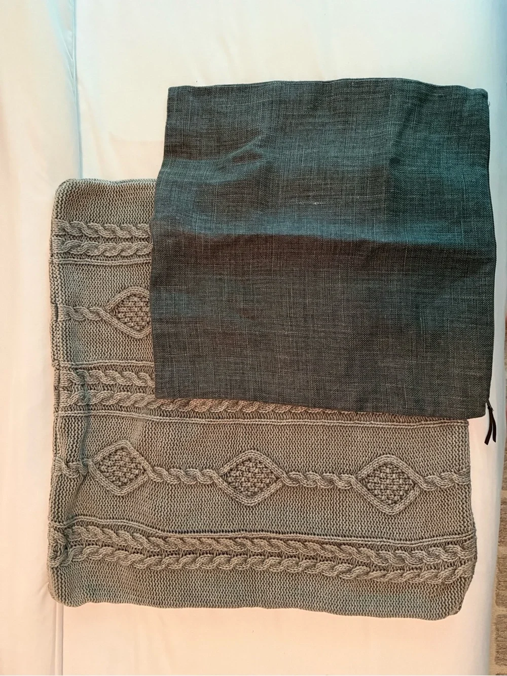 Pottery Barn gray knit throw with charcoal pillow cover