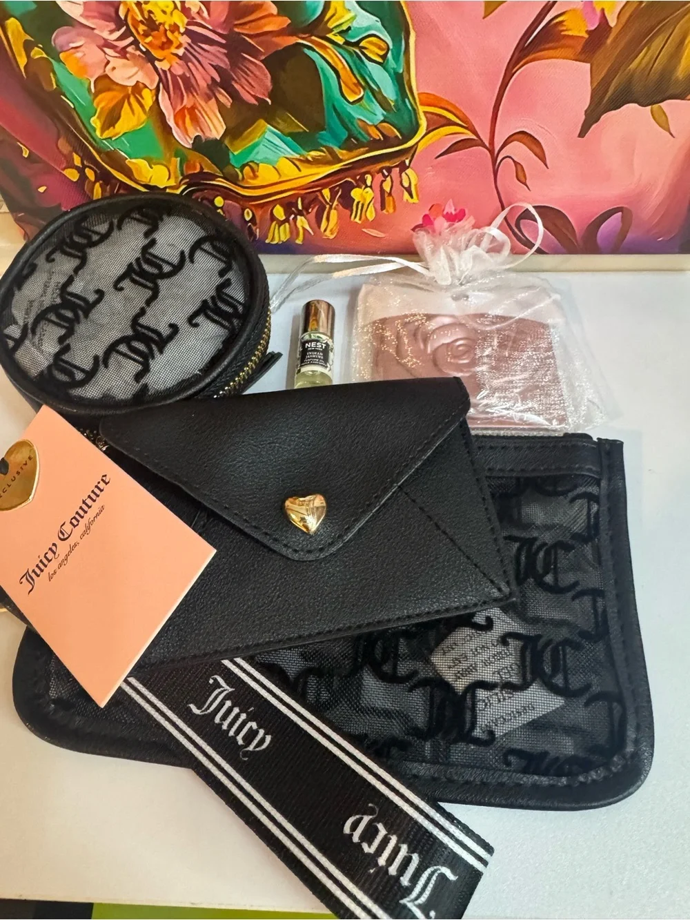 Juicy Couture Set of 3 Wristlet Comes w/ Nest Oil Roll on & Rose Compact Mirror