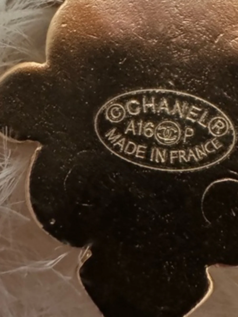 CHANEL gold statement