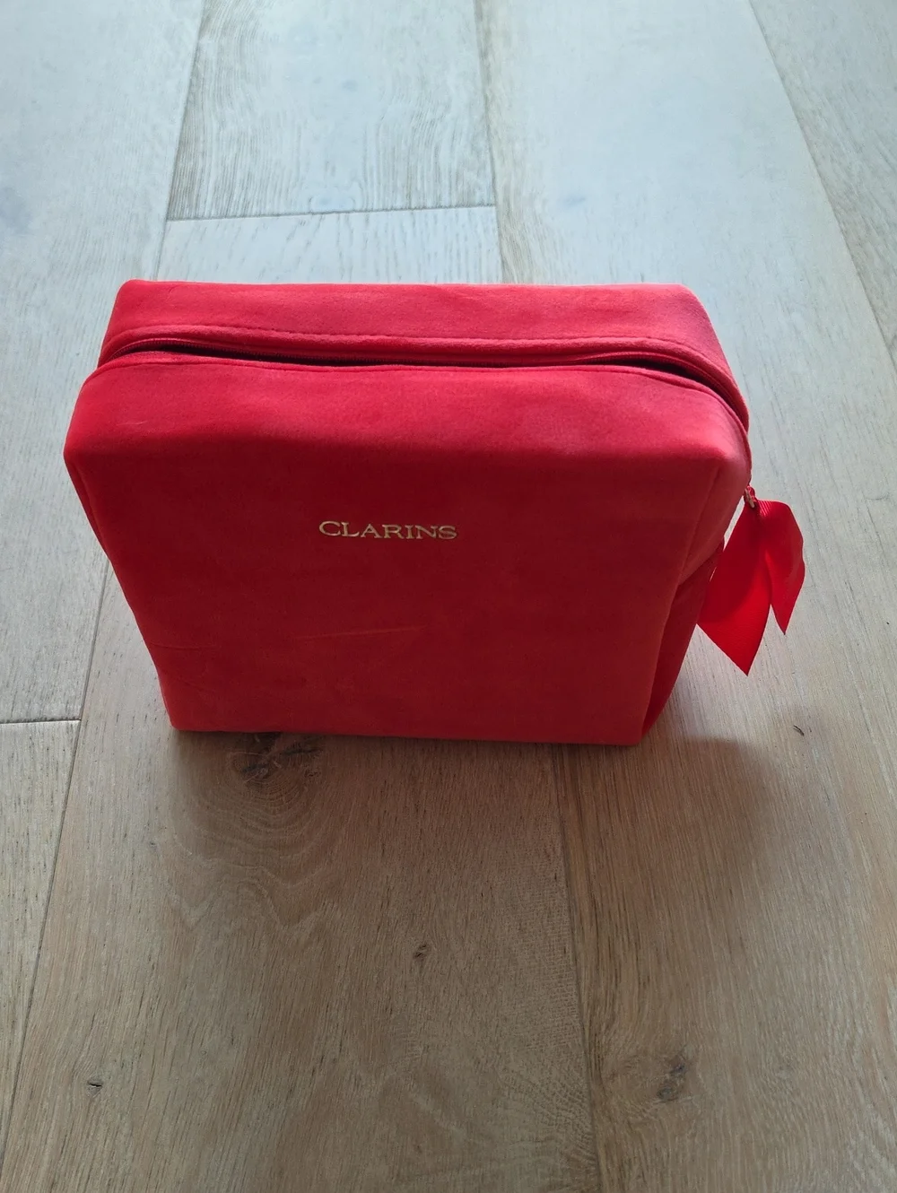 NWOT Clarins Red Velvet 'Star' Toiletry Pouch