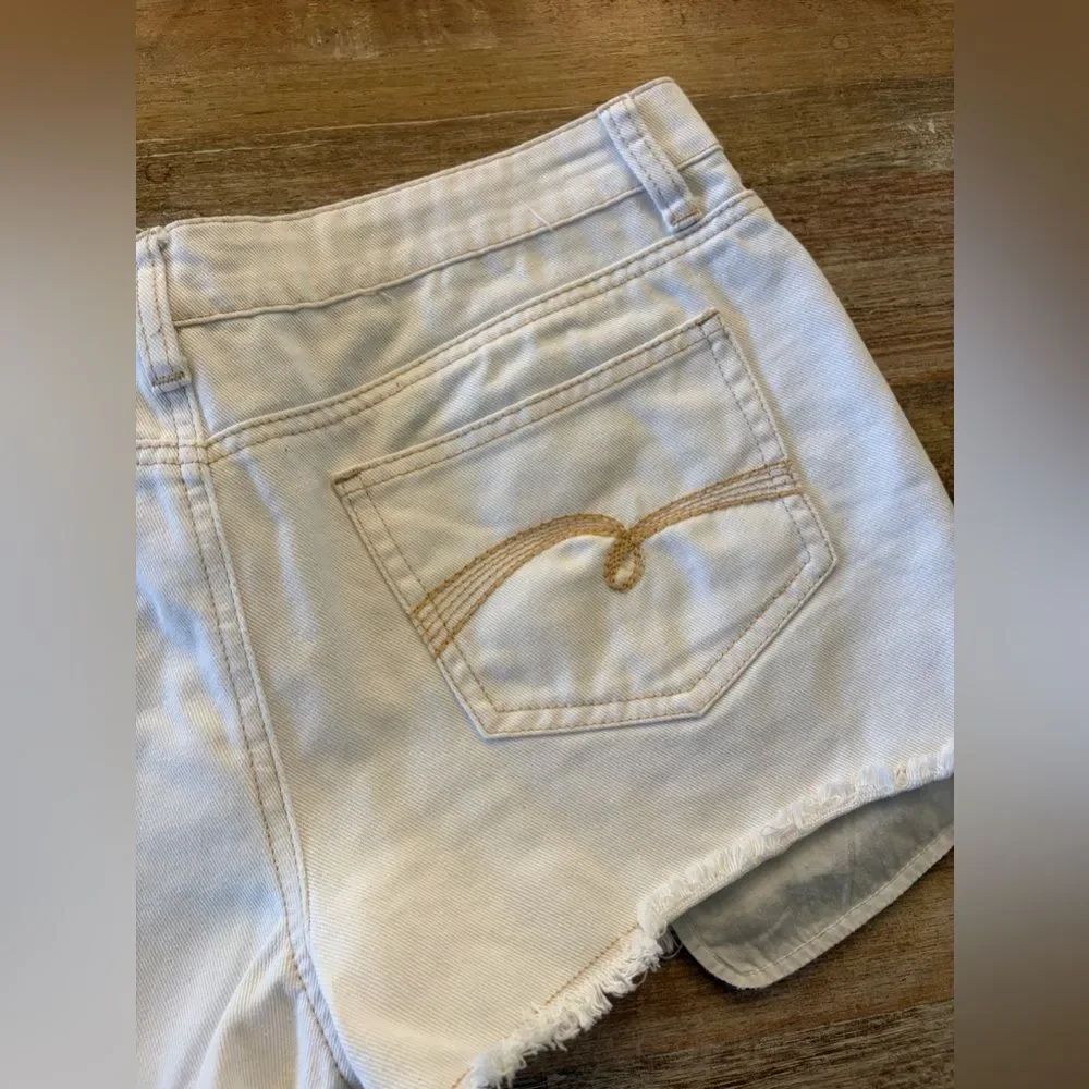Justice white distressed